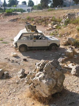 Repurposed car-as-satellite dish in Gaza